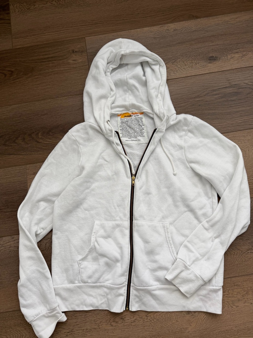 White Aviator Nation Zip-Up Hoodie with Black Lightning Bolt